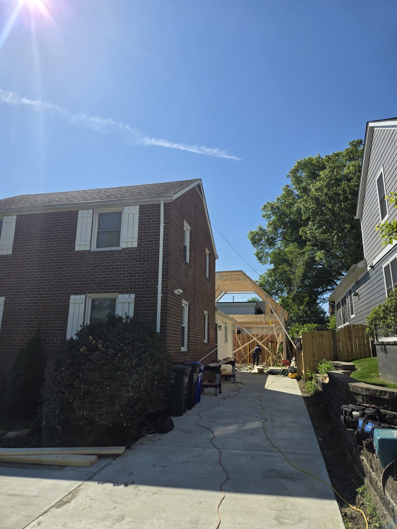 Brick home new framed addition. Home addition project by Potts Brothers Construction, Arlington & Northern Virginia