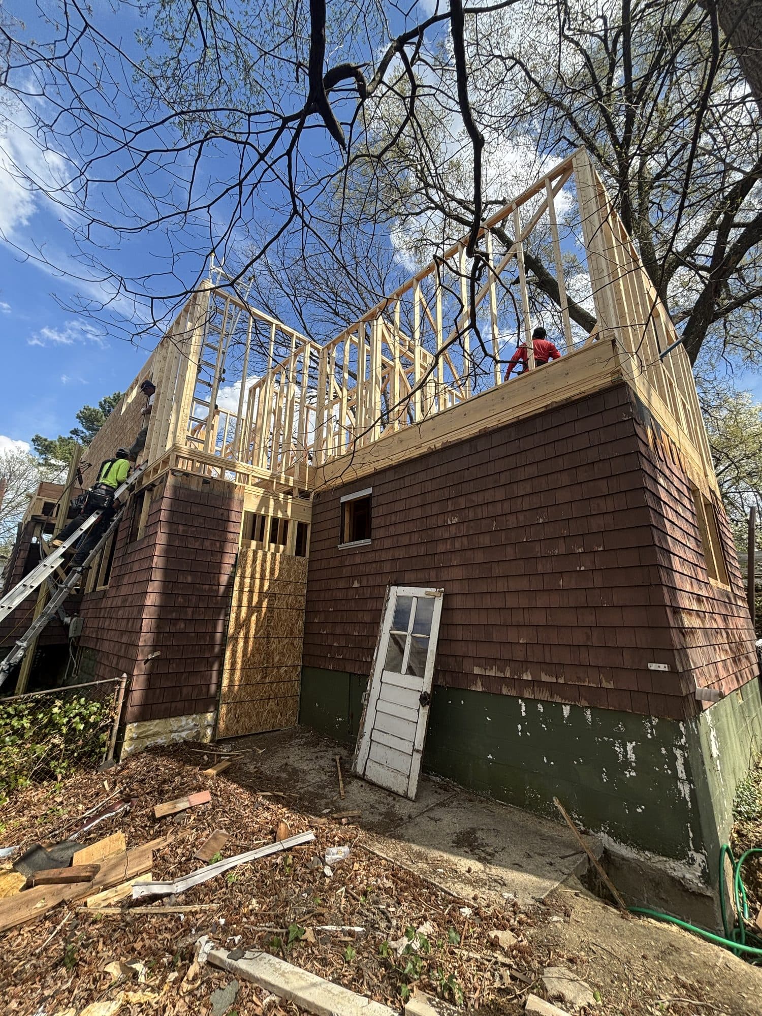 Second story addition framing above shake sided. Home addition project by Potts Brothers Construction, Arlington & Northern Virginia