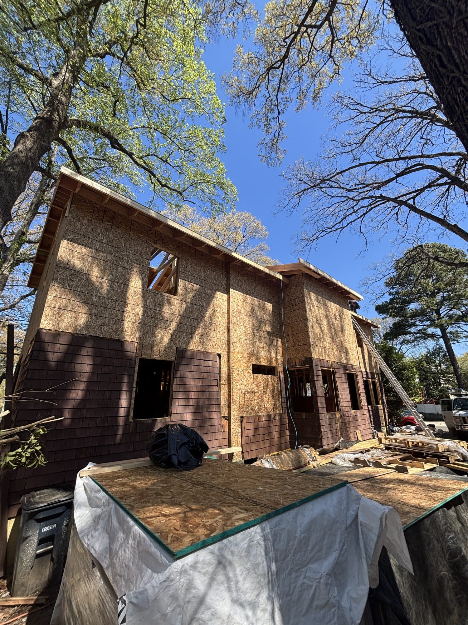 Two story addition exterior under construction. Home addition project by Potts Brothers Construction, Arlington & Northern Virginia