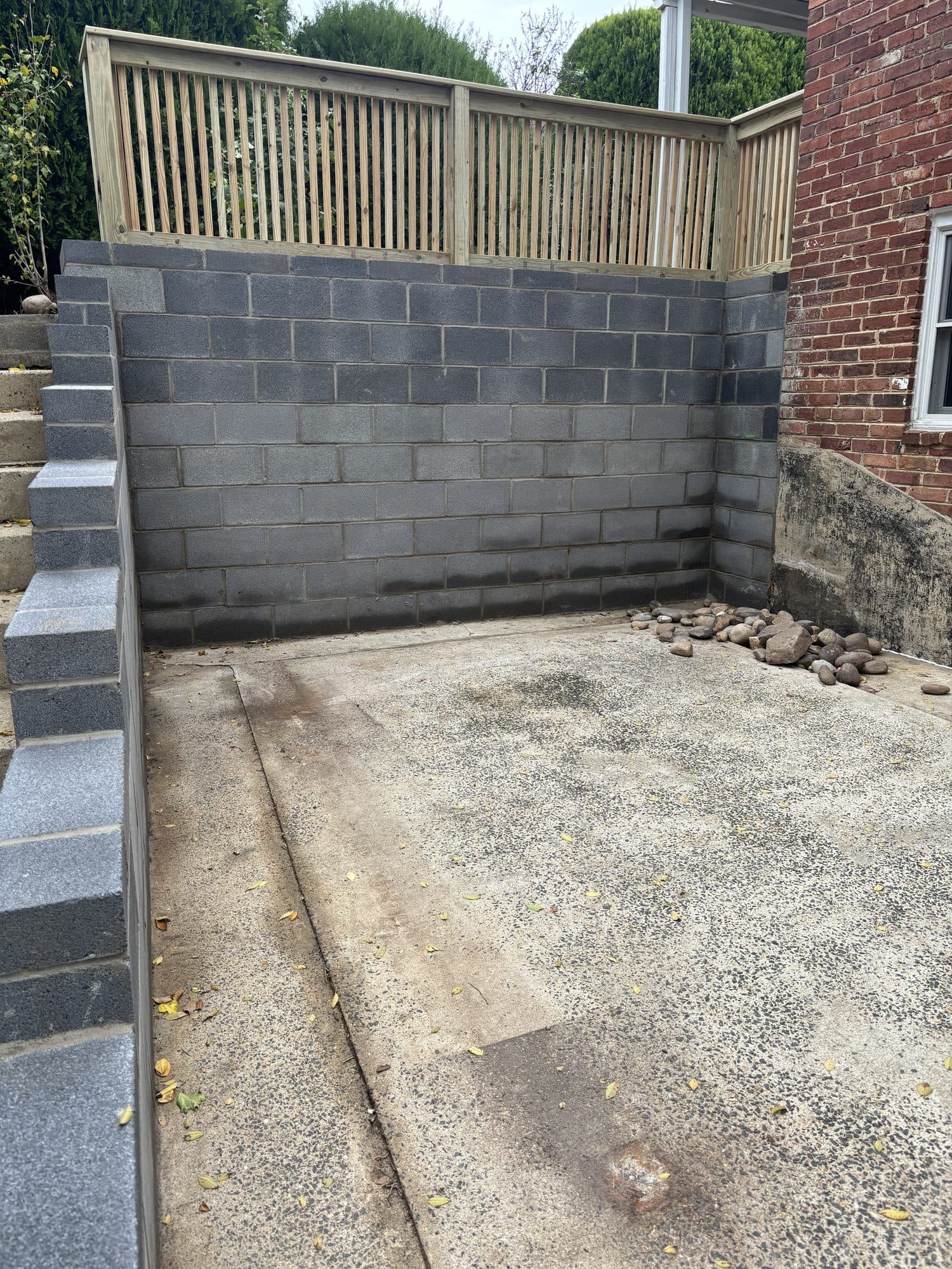 Cinder block retaining wall concrete. Concrete project by Potts Brothers Construction, Arlington & Northern Virginia