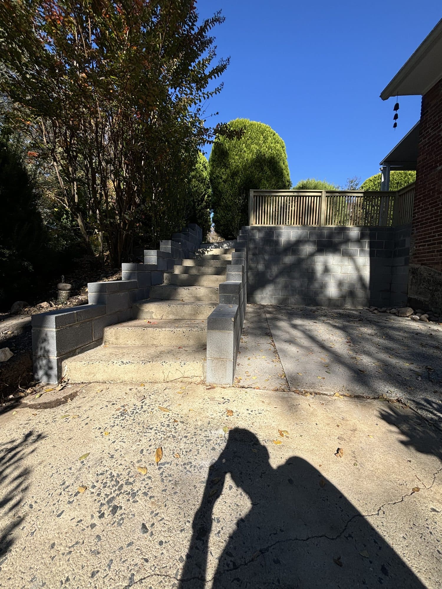 Concrete steps block borders walkway. Concrete project by Potts Brothers Construction, Arlington & Northern Virginia