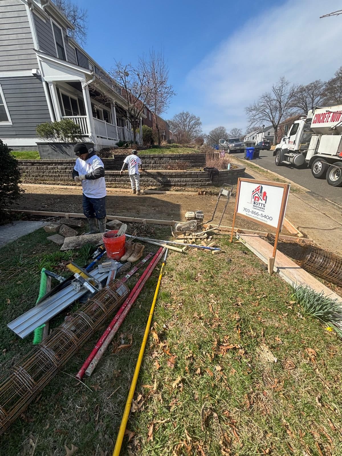 Crew prepping front yard rebar. Concrete project by Potts Brothers Construction, Arlington & Northern Virginia