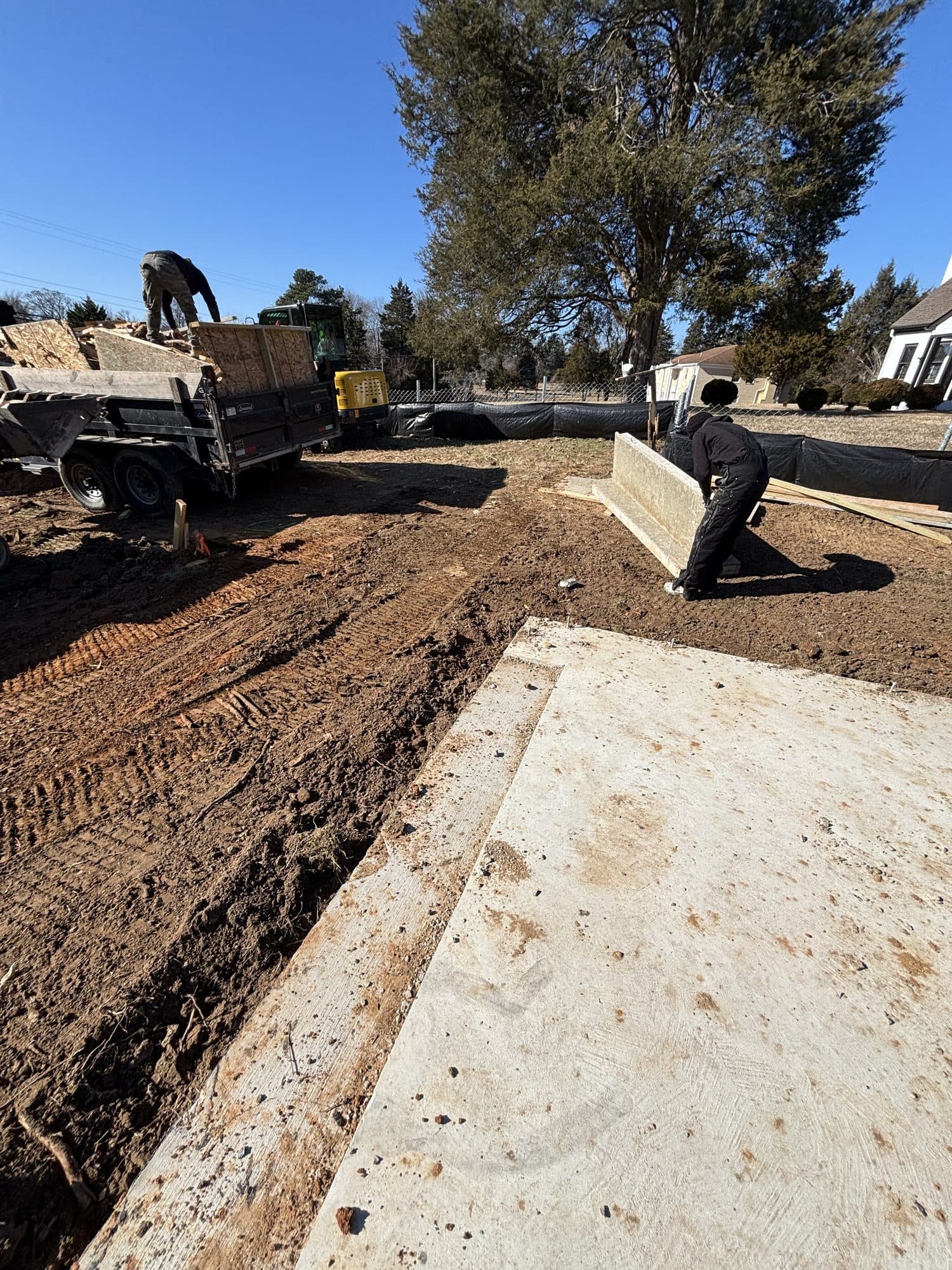 Cured concrete slab grading work. Concrete project by Potts Brothers Construction, Arlington & Northern Virginia