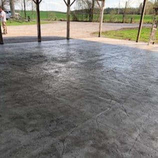 Stamped concrete pavilion floor overlooking field. Concrete project by Potts Brothers Construction, Arlington & Northern Virginia
