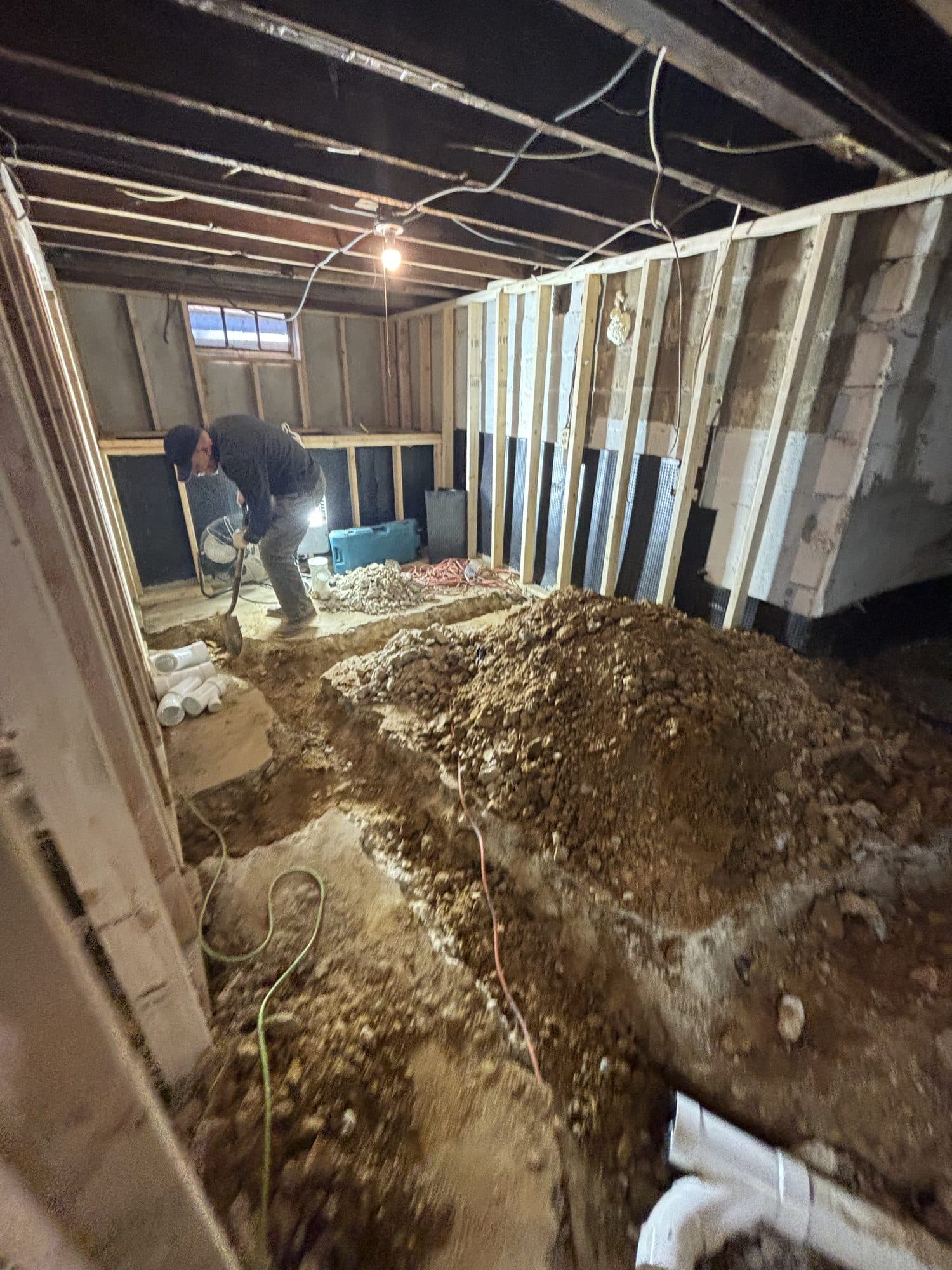 Basement excavation and foundation wall work int. Foundation project by Potts Brothers Construction, Arlington & Northern Virginia