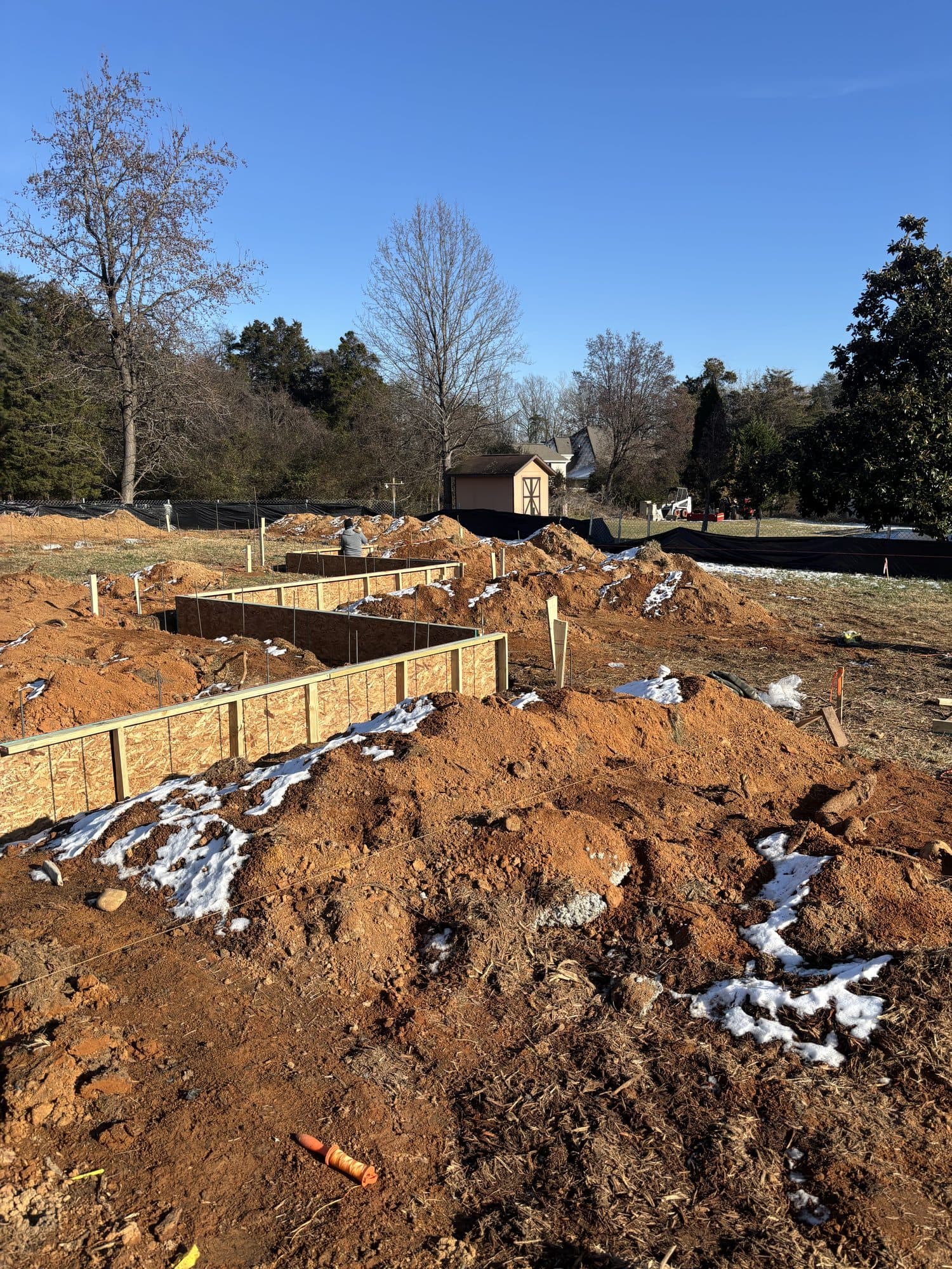 Formed footings and foundation trenches on lot. Foundation project by Potts Brothers Construction, Arlington & Northern Virginia