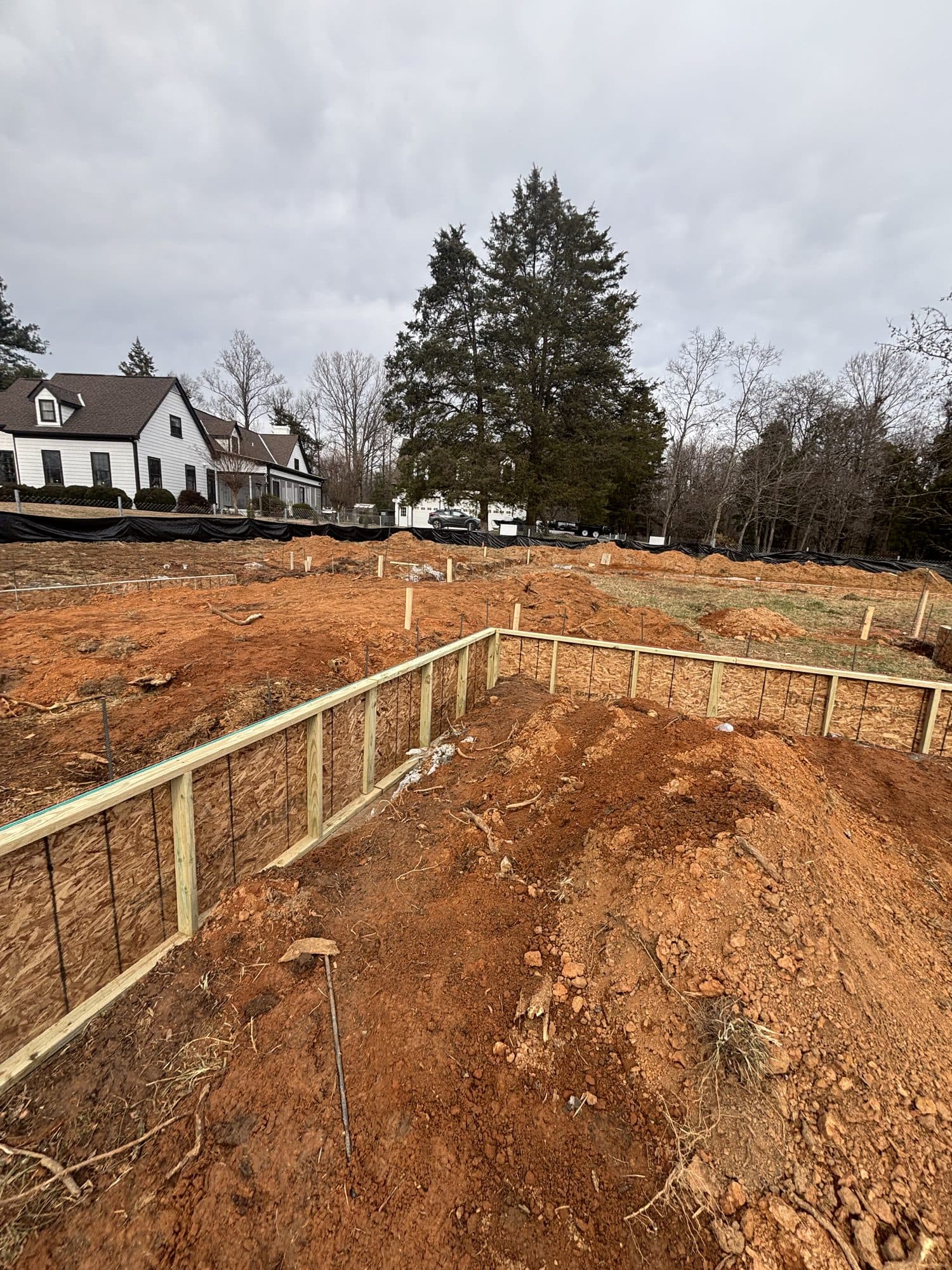 Foundation footing trench with formwork across. Foundation project by Potts Brothers Construction, Arlington & Northern Virginia