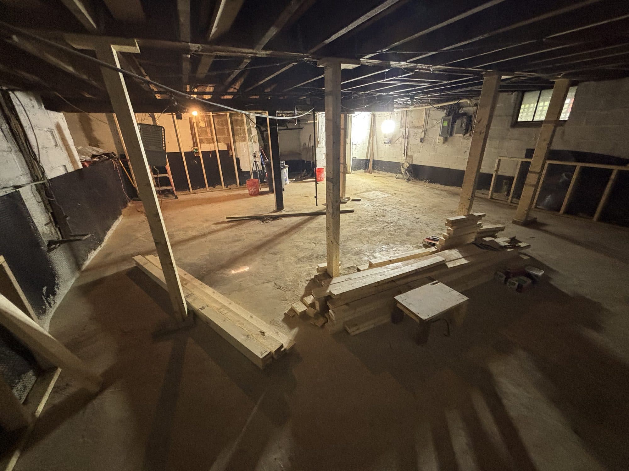 Wide basement interior posts concrete. Foundation project by Potts Brothers Construction, Arlington & Northern Virginia