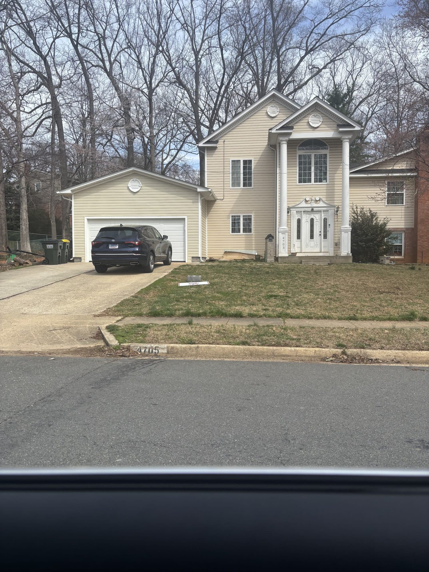 Two story home attached garage. Garage project by Potts Brothers Construction, Arlington & Northern Virginia